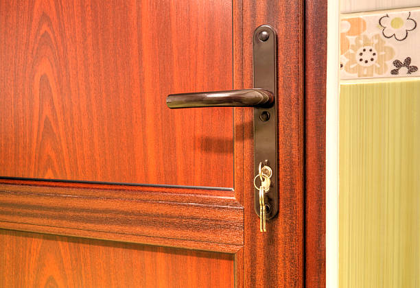 istock Modern wooden door with handle 542791104