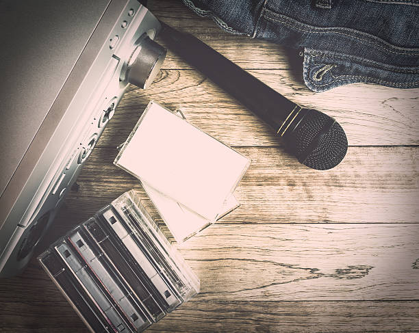 istock Set of audio device on wooden background 542791792
