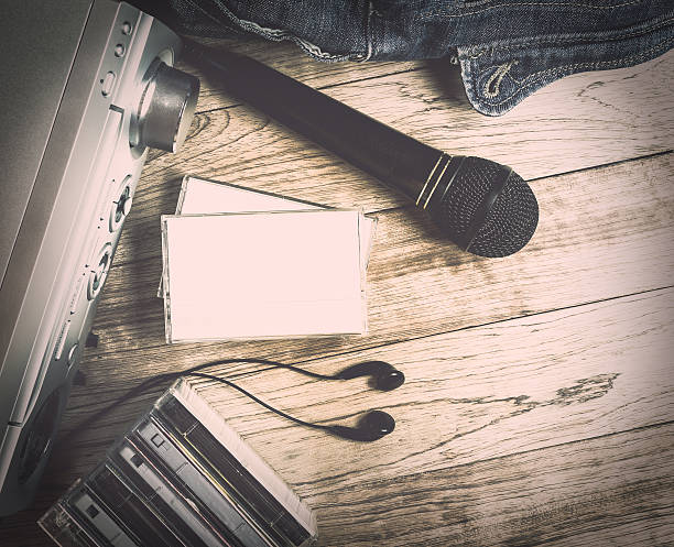 istock Set of audio device on wooden background 542792028