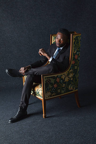 istock African Man Sitting In An Old Armchair 542792088