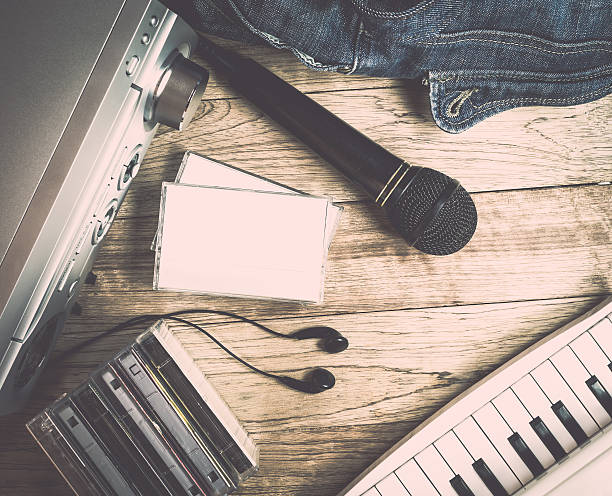 Set of audio device on wooden background