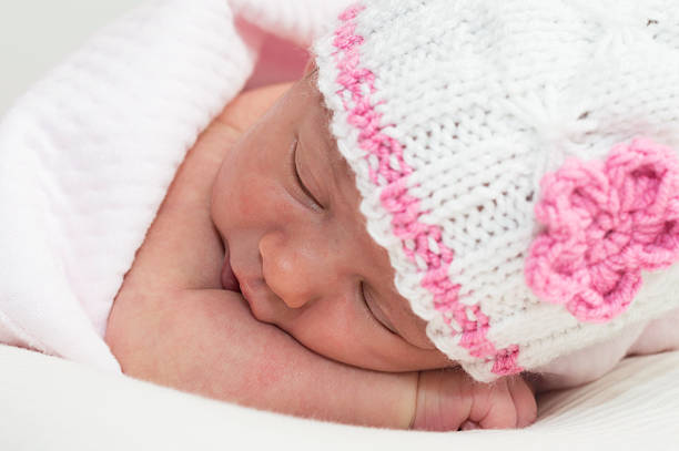istock Newborn baby girl sleeping 542794650