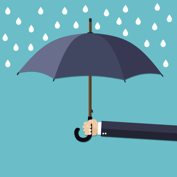 istock Hand of man holding umbrella under rain. 542795240