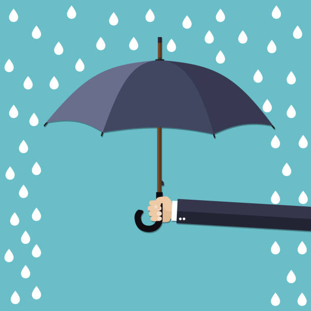 istock Hand of man holding umbrella under rain. 542795282
