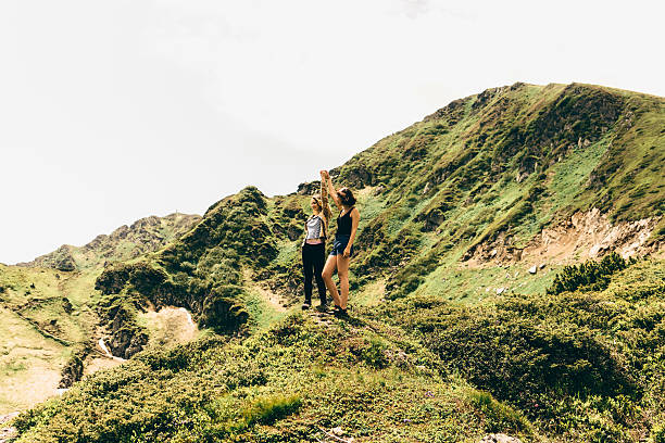 istock Two girls in mountains 542796092