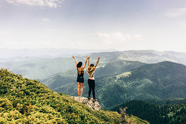 istock Two girls in mountains 542796140