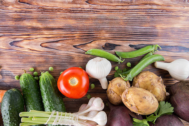 istock vegetables on the wooden background 542796200