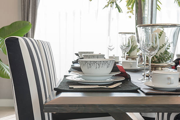 istock table set on wooden table in luxury dining room 542797758