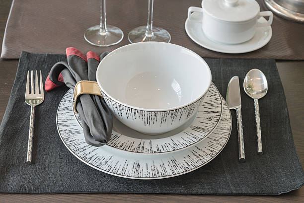 istock table set on wooden table in luxury dining room 542797868