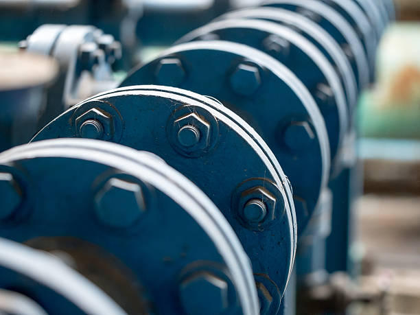 boulons et écrous joint de connexion de tuyaux en acier inoxydable bleu - valve water water pipe pipe photos et images de collection