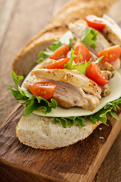 istock Grilled chicken sandwich with basil and tomatoes 542800408