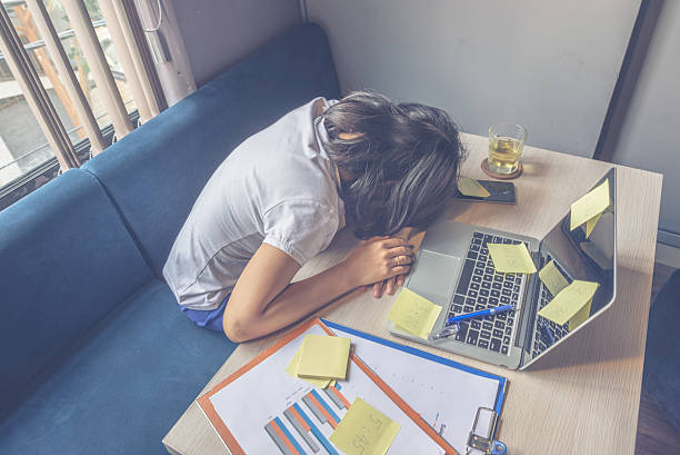 istock Young freelancer feel tired, frustrated and fall asleep on laptop 542803056
