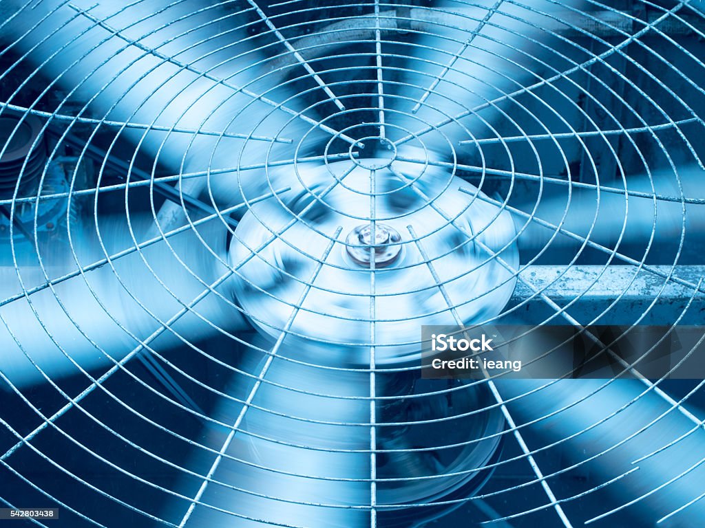 Blue tone of HVAC (Heating, Ventilation and Air Conditioning) blades Blue tone of HVAC (Heating, Ventilation and Air Conditioning) spining blades / Closeup of ventilator / Industrial ventilation fan background / Air Conditioner Ventilation Fan / Ventilation system Air Conditioner Stock Photo
