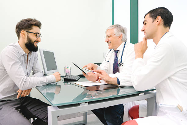 istock Mature Male Doctor Using A Digital Tablet For His Diagnosis. 542803712