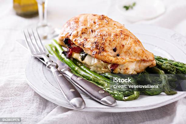 Grilled Chicken Breast Stuffed With Mozzarella Stock Photo - Download Image Now - Barbecue - Meal, Basil, Brown
