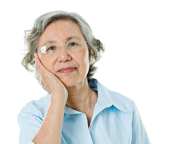 istock Senior businesswoman with toothache 542805014