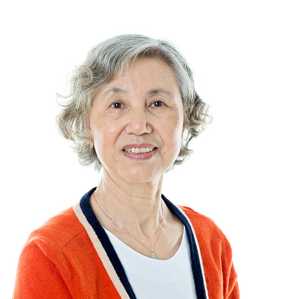 istock Attractive senior woman isolated on white background 542805132