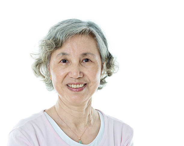 istock Attractive senior woman isolated on white background 542805186