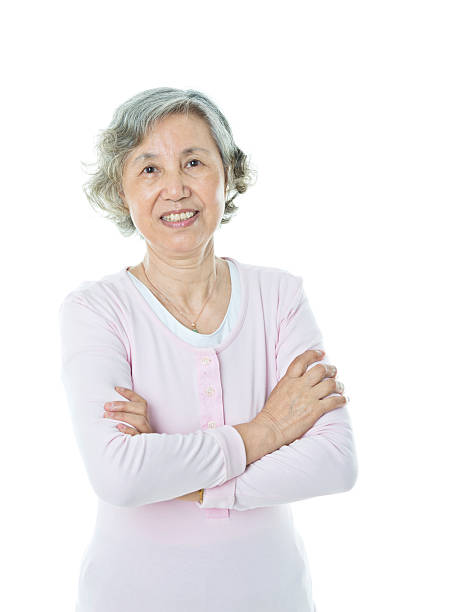 istock Attractive senior woman isolated on white background 542805380