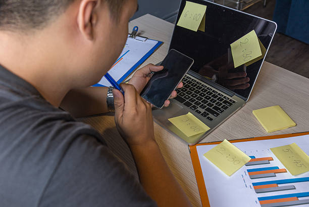 istock The man busy with completing his report before deadline comes 542806456