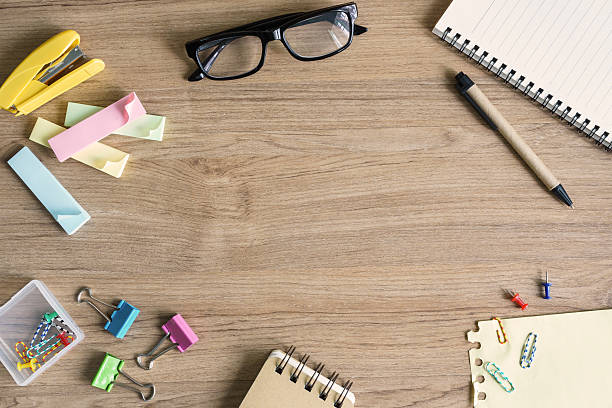 istock Office supplies on wooden background 542808578