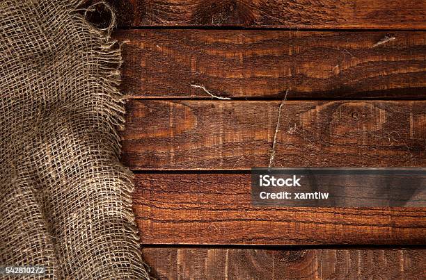 Burlap Texture On Wooden Table Stock Photo - Download Image Now - Backgrounds, Burlap, Wood - Material