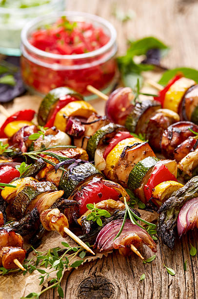 istock Grilled vegetable and meat skewers 542814430