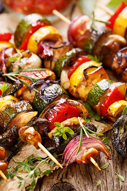 istock Grilled vegetable and meat skewers 542814590