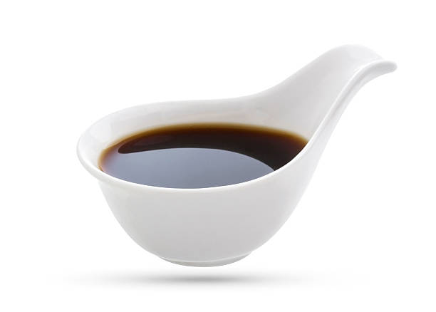 istock Soy sauce in bowl isolated on white background. 542815312
