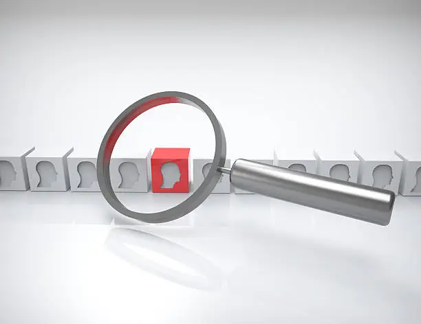 Photo of magnifying glass searching people