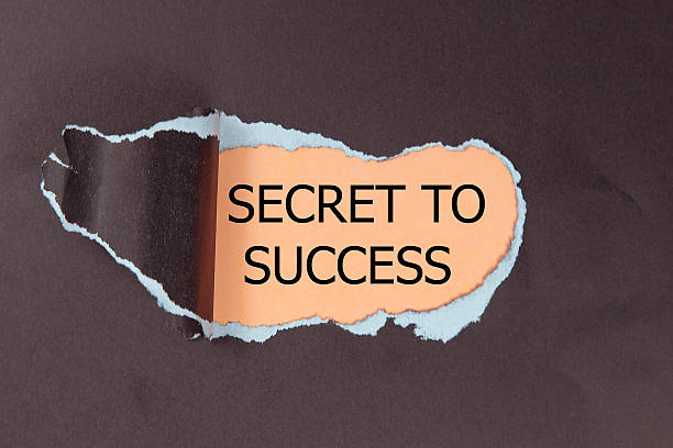 istock secret to success written under torn paper 542821098