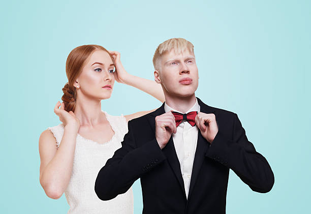 istock Well-dressed couple in luxury clothes isolated 542821232