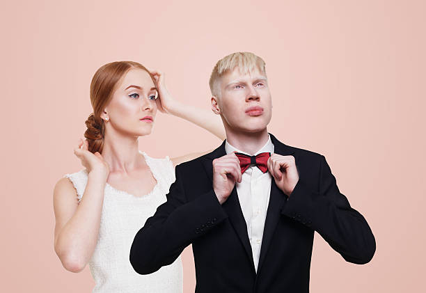istock Well-dressed couple in luxury clothes isolated 542821250
