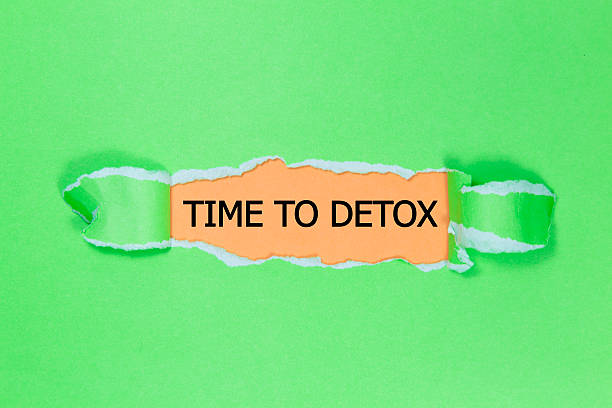 istock time to detox written under torn paper 542821336