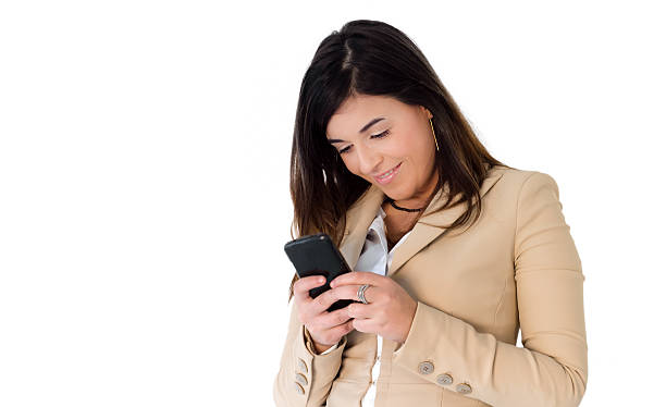 istock Beautiful smiling woman using a phone isolated in white 542821844