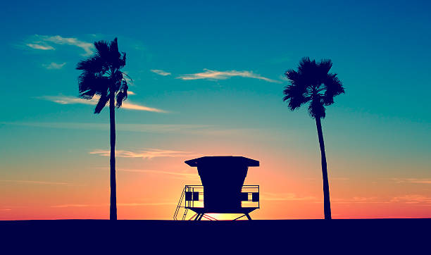 Vintage Lifeguard Tower Vintage Lifeguard Tower on Beach at sunset in San Diego, California hut photos stock pictures, royalty-free photos & images