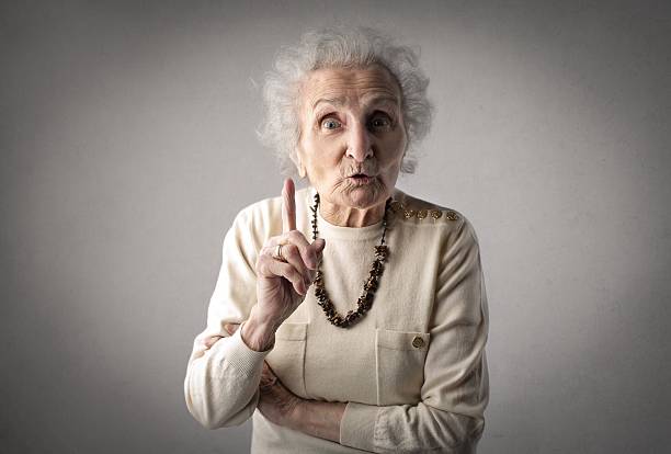 Frustrated old woman stock photo