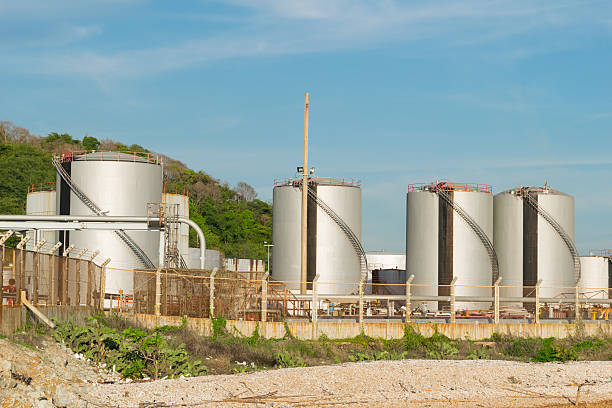 istock Oil refinery industry with blue sky background 542824006