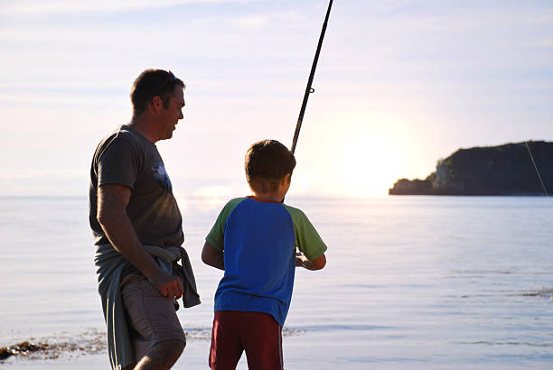 istock Father and Son Fishing 542824900