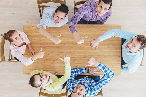 istock Coworkers with thumbs up 542825750