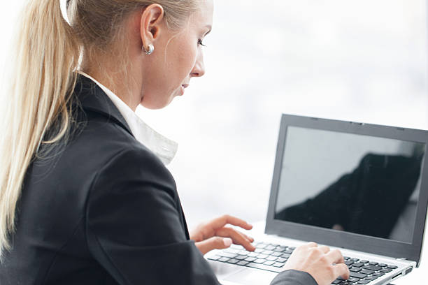 istock Business woman with laptop 542826452