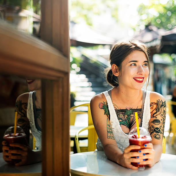 istock Pretty Tattooed Girl Cafe Relaxation Concept 542826580