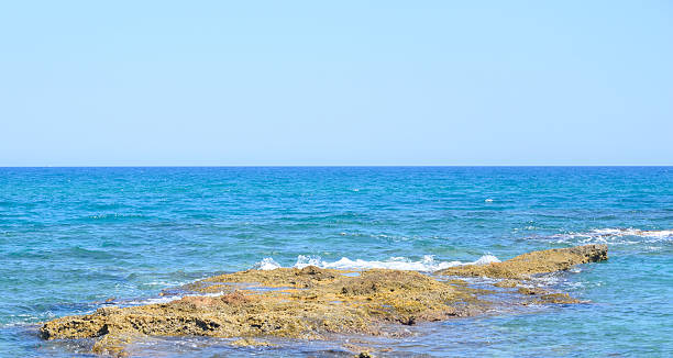 istock Rocks on the coast of Cretan Sea. 542827364