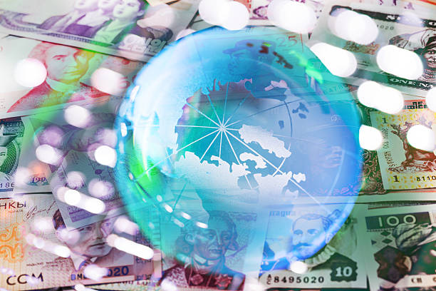 istock world money background with global ball 542828210