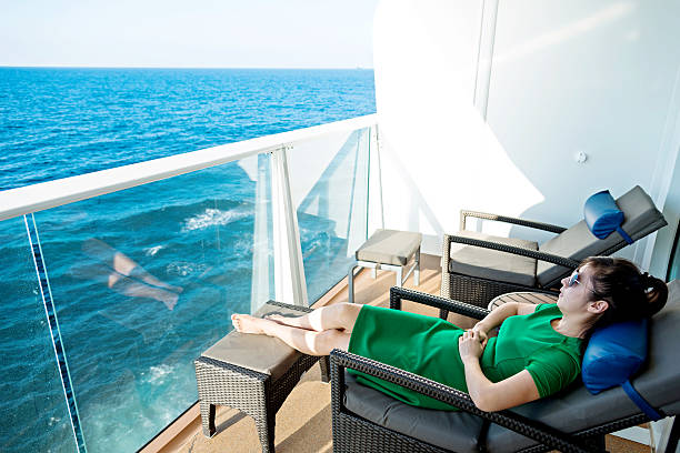 Young asian woman relaxing on cruise.