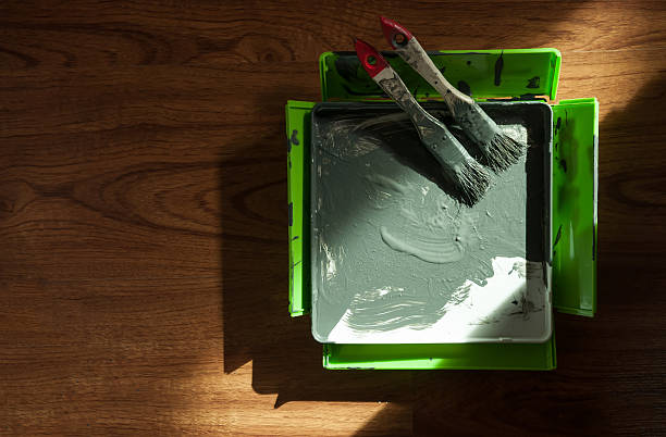 istock Grey paint in paint tray. 542832150