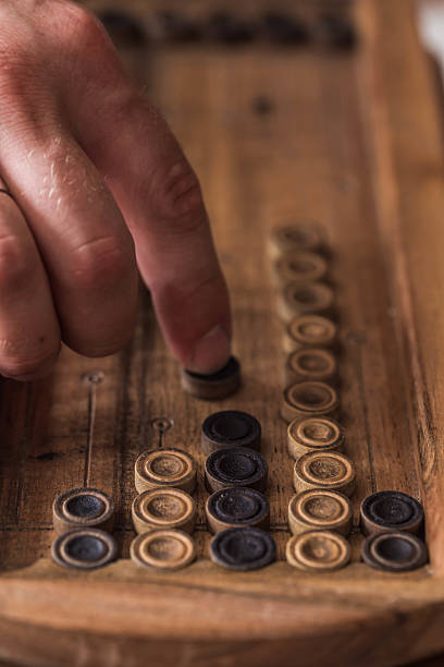 istock wooden Board with backgammon, pawns, dice, close up 542832222