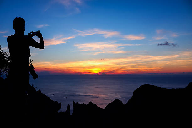 istock Photographer on the mountain 542832548