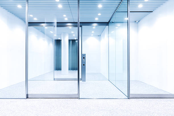istock glass door with hi-tech fingerprint lock in modern building 542832956