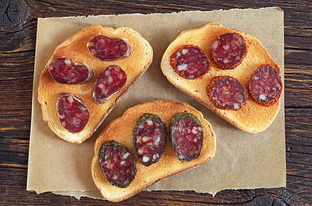 istock Sandwiches with different salami sliced 542833080
